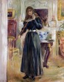 Julie tocando el violín Berthe Morisot